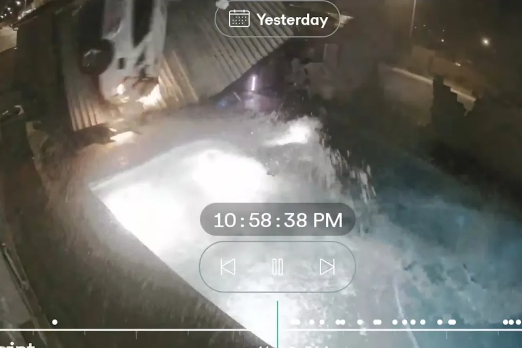 It strikes the roof of the backyard pool house before landing on the property at the edge of the pool.