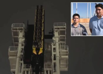 Roller coaster malfunction leaves two men trapped 130 feet above Texas park for nearly an hour