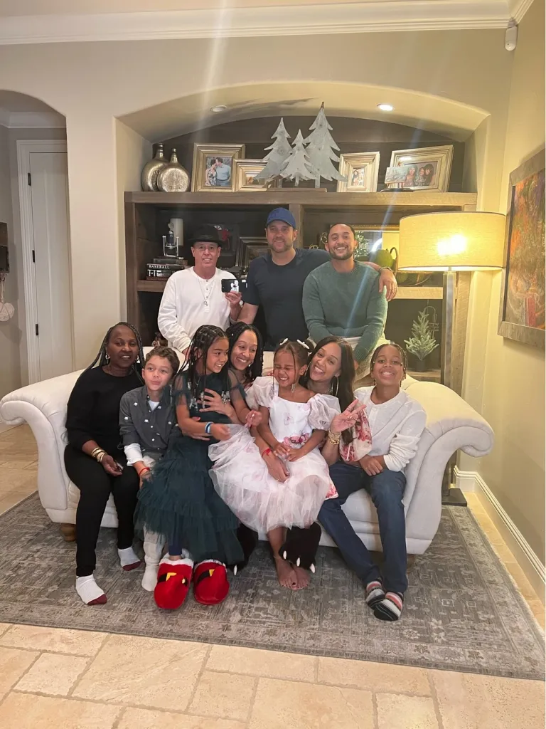 Tia and Tamera Mowry with their family in a photo from Nov. 2025