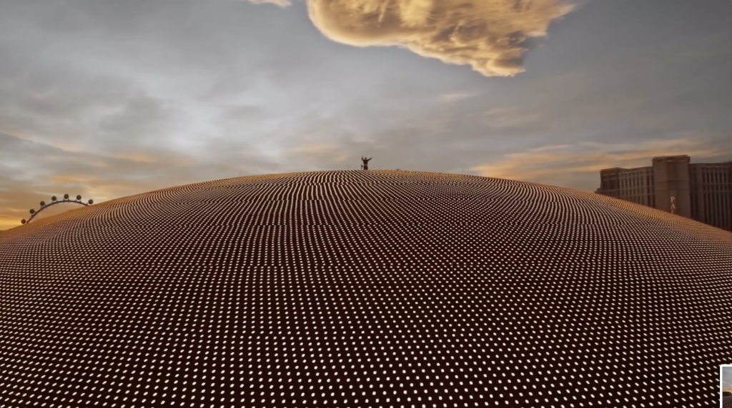A man standing atop the Las Vegas Sphere.