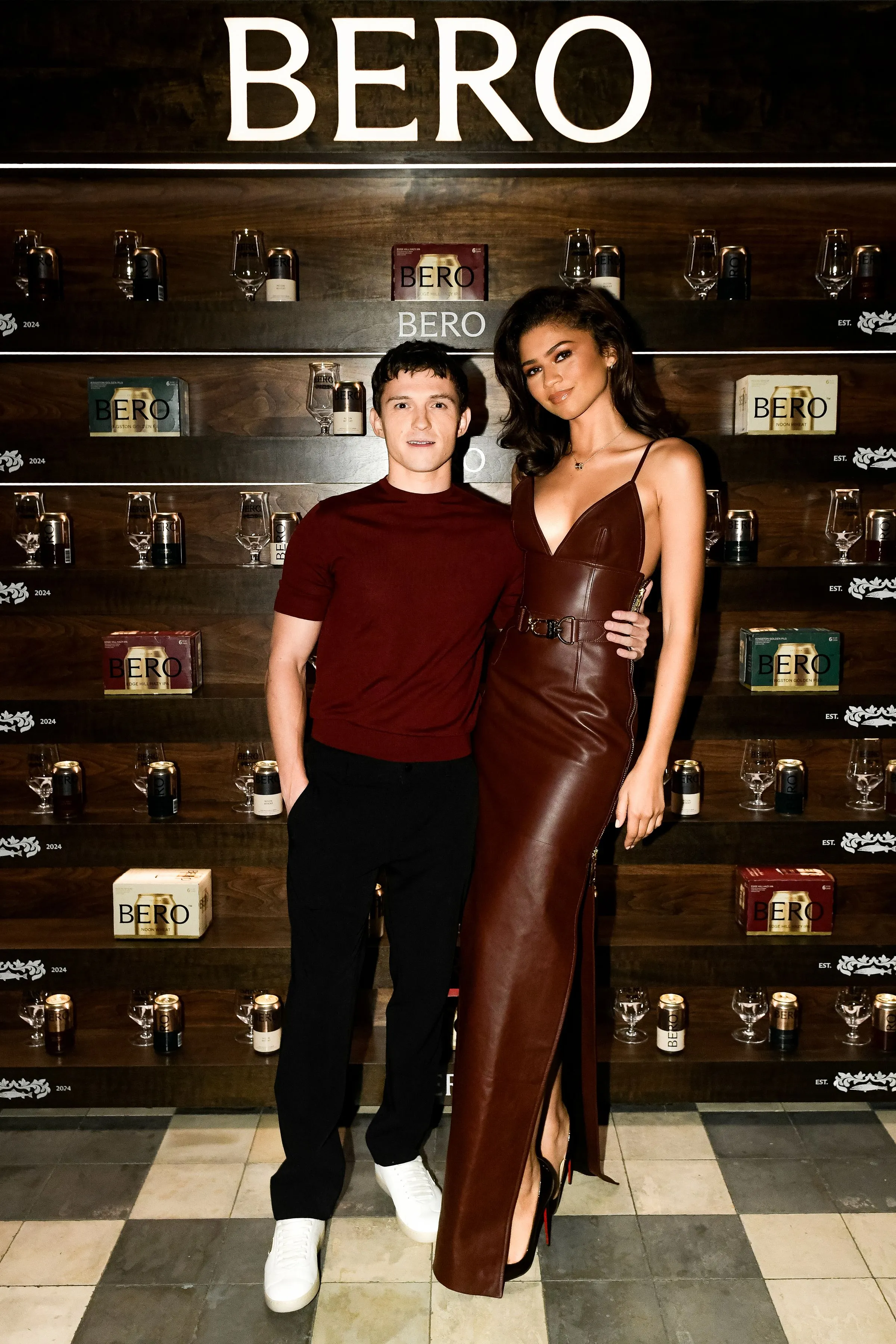 Tom Holland and Zendaya pose together at the Bero launch event.
