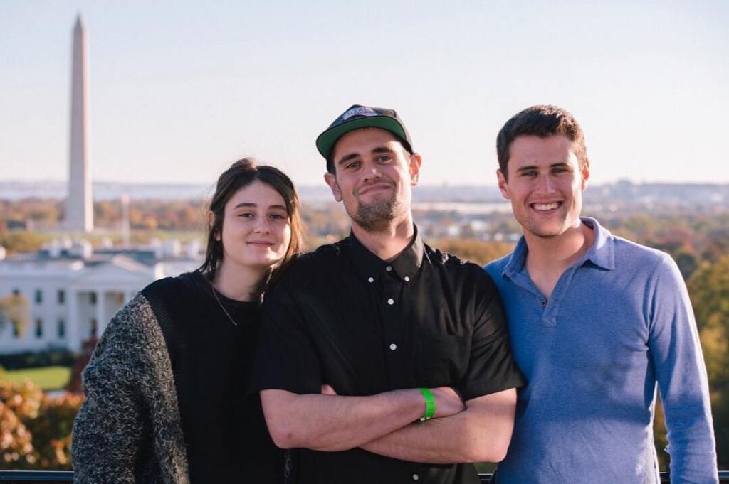 Romy, Nick, and Jake Reiner smiling with the Washington Monument and White House in the background.