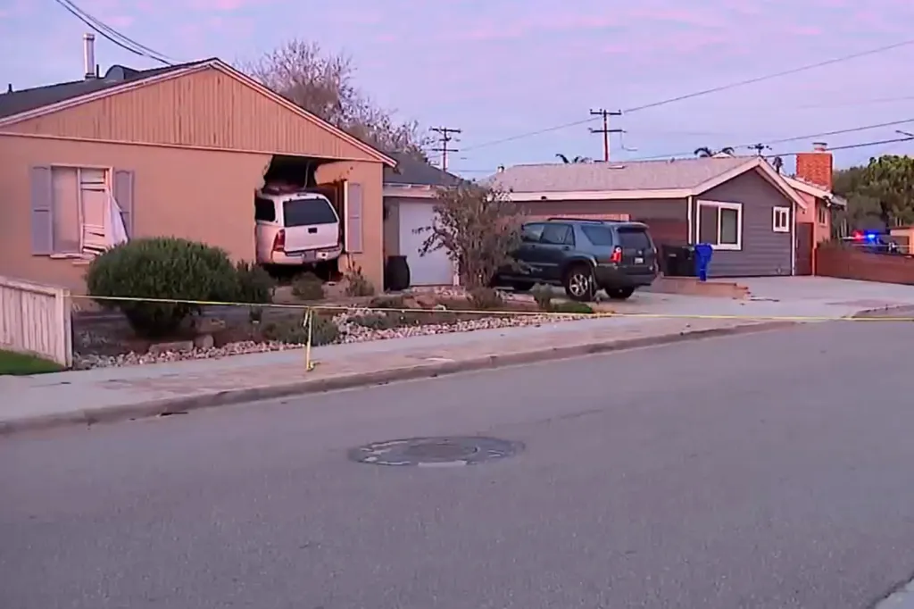 A white Toyota Tacoma crashed into a house in San Diego.