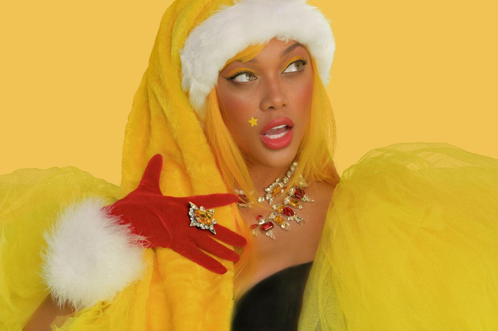 Tyra Banks as Santa SMiZE in a promo photo.
