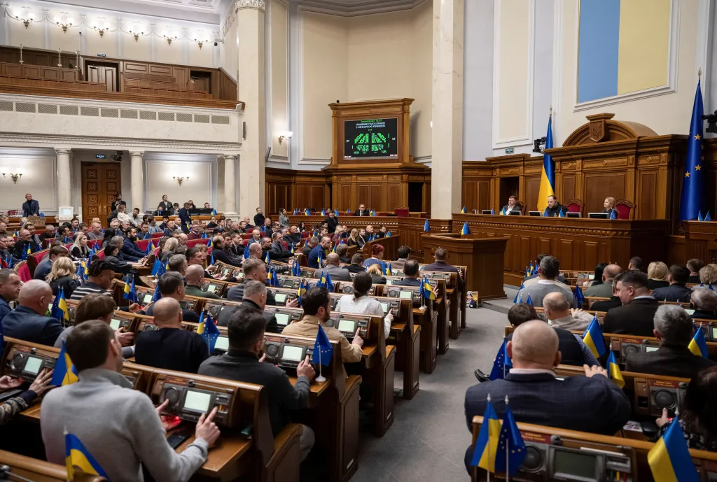 Ukrainian lawmakers attend a parliament session in Kyiv.