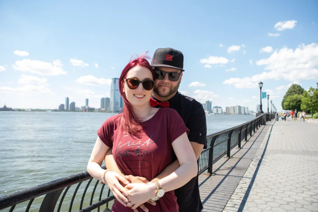 A man proposing to a woman wearing a 