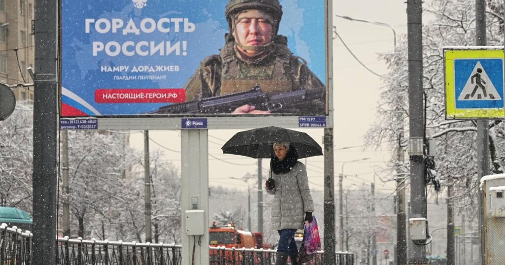 A South African radio presenter is arrested on suspicion of recruiting fighters for Russia