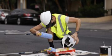 Activists paint Westwood crosswalk to improve safety. Police shut down effort, cite volunteer for vandalism