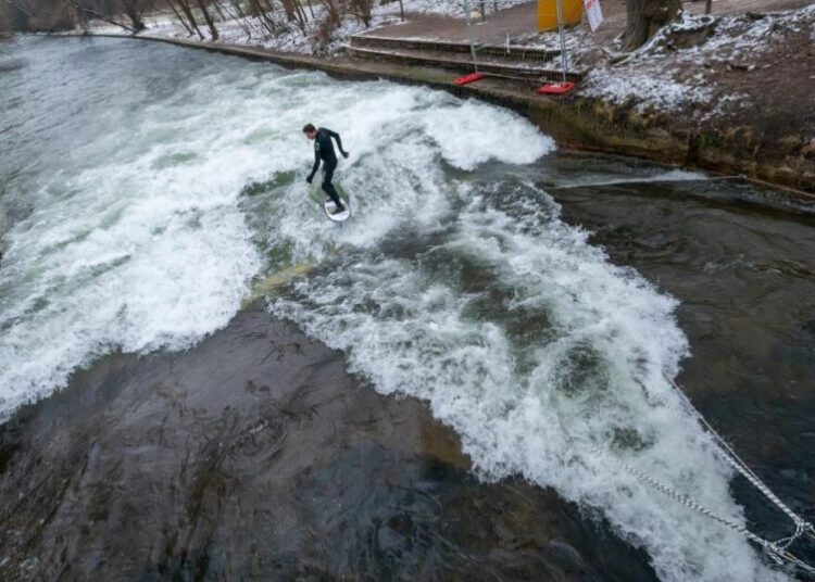Debate over river surfing in German park gets gnarly after city removes wave-creating device