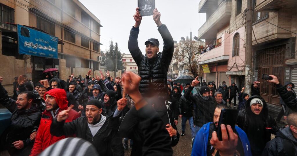 Hundreds mourn in Syria’s Homs after deadly mosque bombing