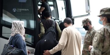 U.S. tells Afghan migrants to report on Christmas, New Year’s day