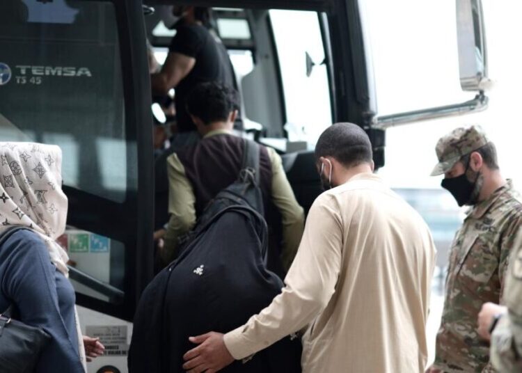 U.S. tells Afghan migrants to report on Christmas, New Year’s day