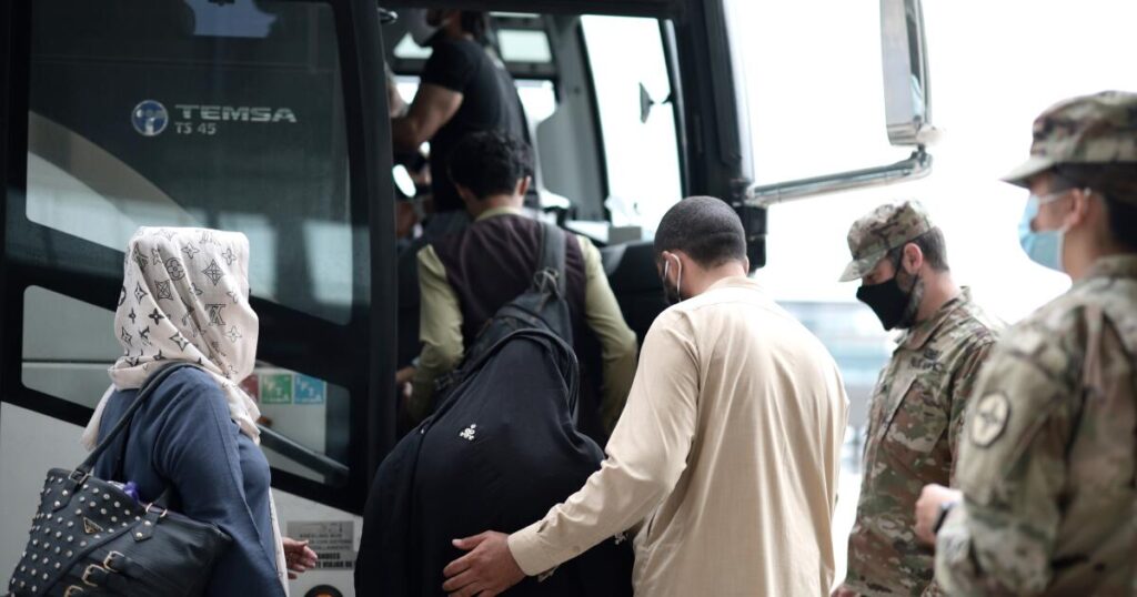 U.S. tells Afghan migrants to report on Christmas, New Year’s day