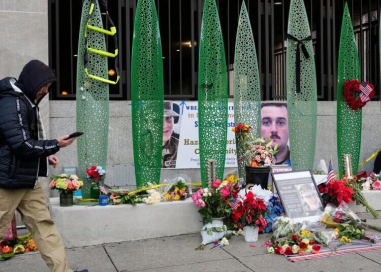 National Guard member shot in Washington has shown encouraging signs, W. Virginia governor says