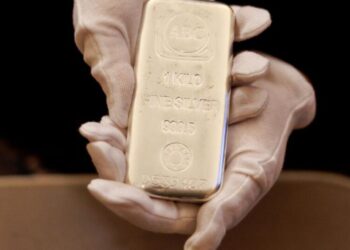 Silver swings amid concerns that the precious metal is overheating