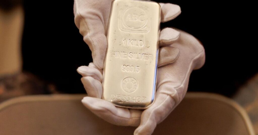 Silver swings amid concerns that the precious metal is overheating