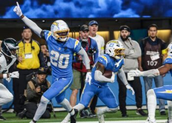 Justin Herbert and Chargers show true grit, defeating Eagles in an OT turnover-fest