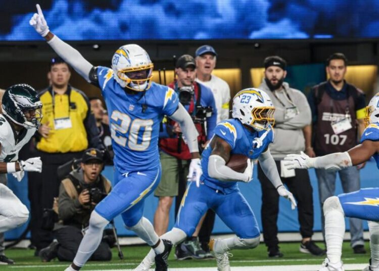 Justin Herbert and Chargers show true grit, defeating Eagles in an OT turnover-fest