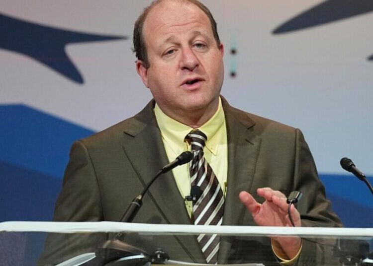 Colorado governor accuses Trump of playing ‘political games’ after disaster request denials