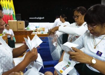 Myanmar holds first election since military seized power, but observers say the vote is a sham