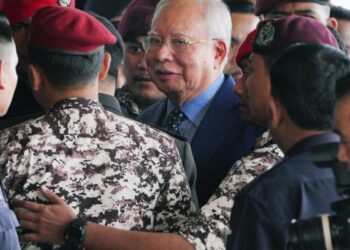 Former Malaysian leader sentenced to 15 years and hefty fine in corruption trial