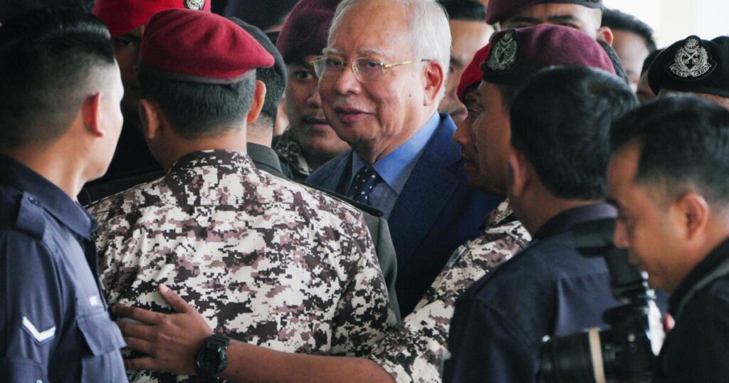 Former Malaysian leader sentenced to 15 years and hefty fine in corruption trial
