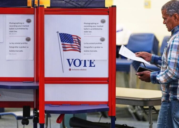 Justice Department sues four more states for access to detailed voter data