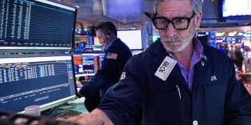 Wall Street pulls near its all-time high