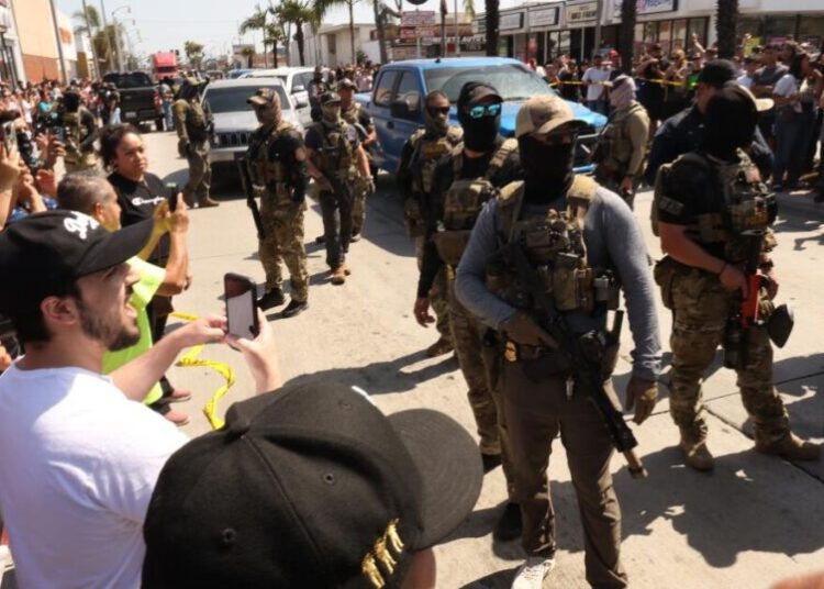 L.A. County supervisors are set to ban masks worn by ICE agents. Can they win a battle with Trump?