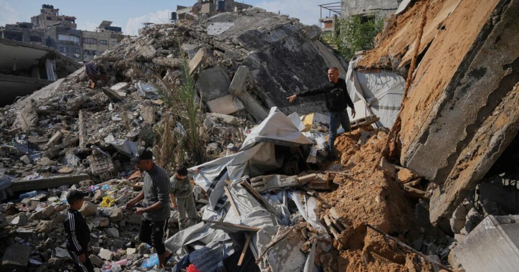 Gaza families struggle to recover from days of torrential rains that killed 12 people