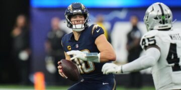 Chargers sweep Raiders, but Justin Herbert injury could complicate playoff path