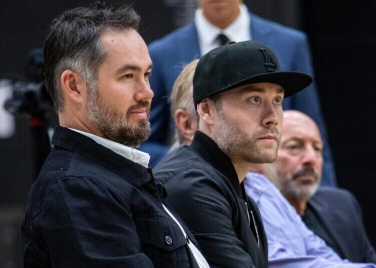 Take a swing? Two Buss brothers consider investing in baseball’s Athletics