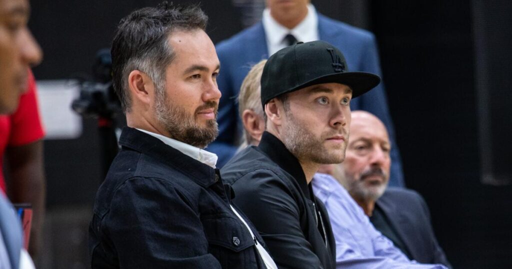 Take a swing? Two Buss brothers consider investing in baseball’s Athletics