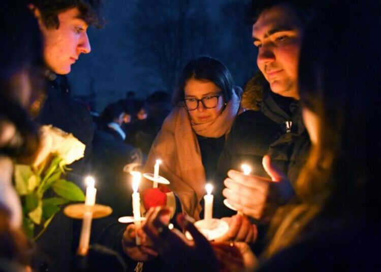 Authorities renew search for the Brown University shooter after releasing a person of interest