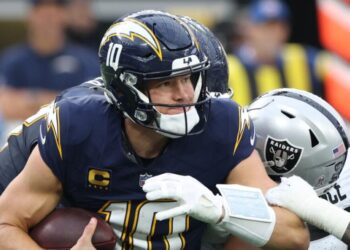 Justin Herbert considered day to day after undergoing hand surgery