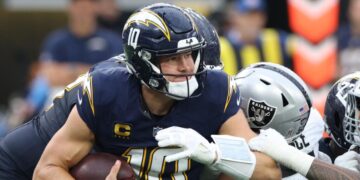 Justin Herbert considered day to day after undergoing hand surgery