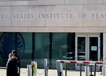 Trump is fighting the Institute of Peace in court. Now, his name is on the building