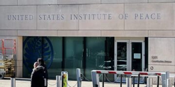 Trump is fighting the Institute of Peace in court. Now, his name is on the building