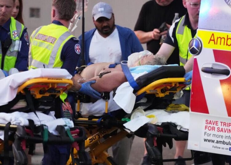 Bystander shown in videos disarming gunman during Australian beach shooting commended for bravery