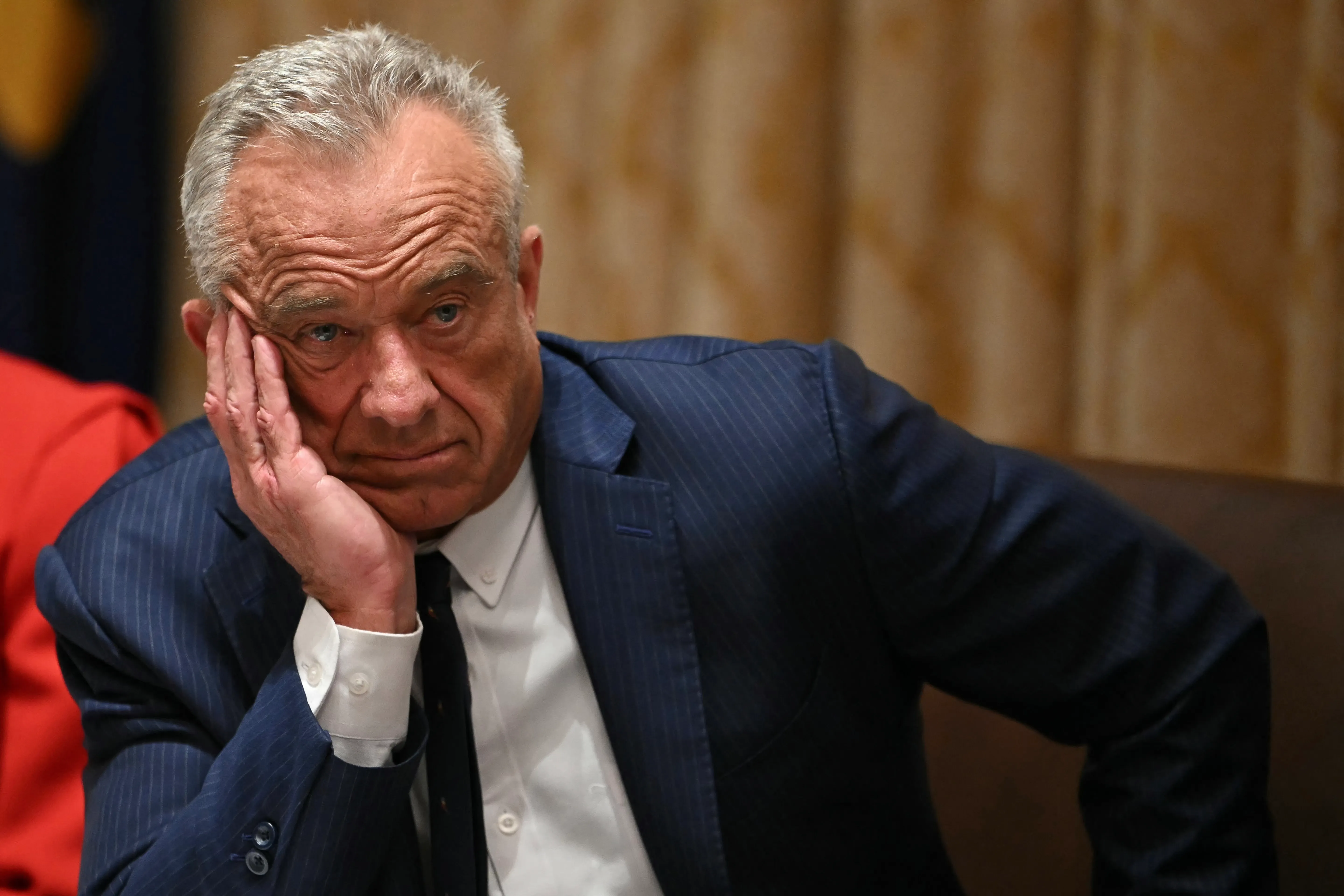 US Secretary of Health and Human Services Robert F. Kennedy Jr. looks on during a Cabinet Meeting.