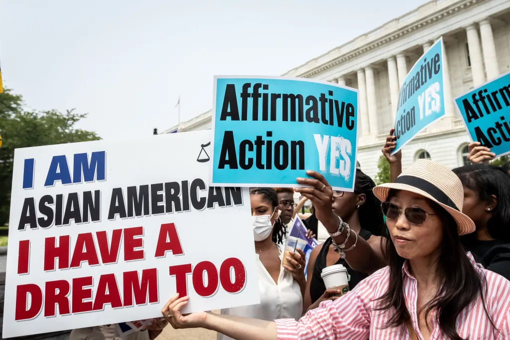 People protesting the Supreme Court's affirmative action ruling.