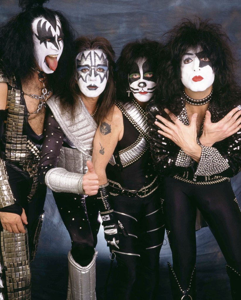 The rock group Kiss in full makeup and costumes.