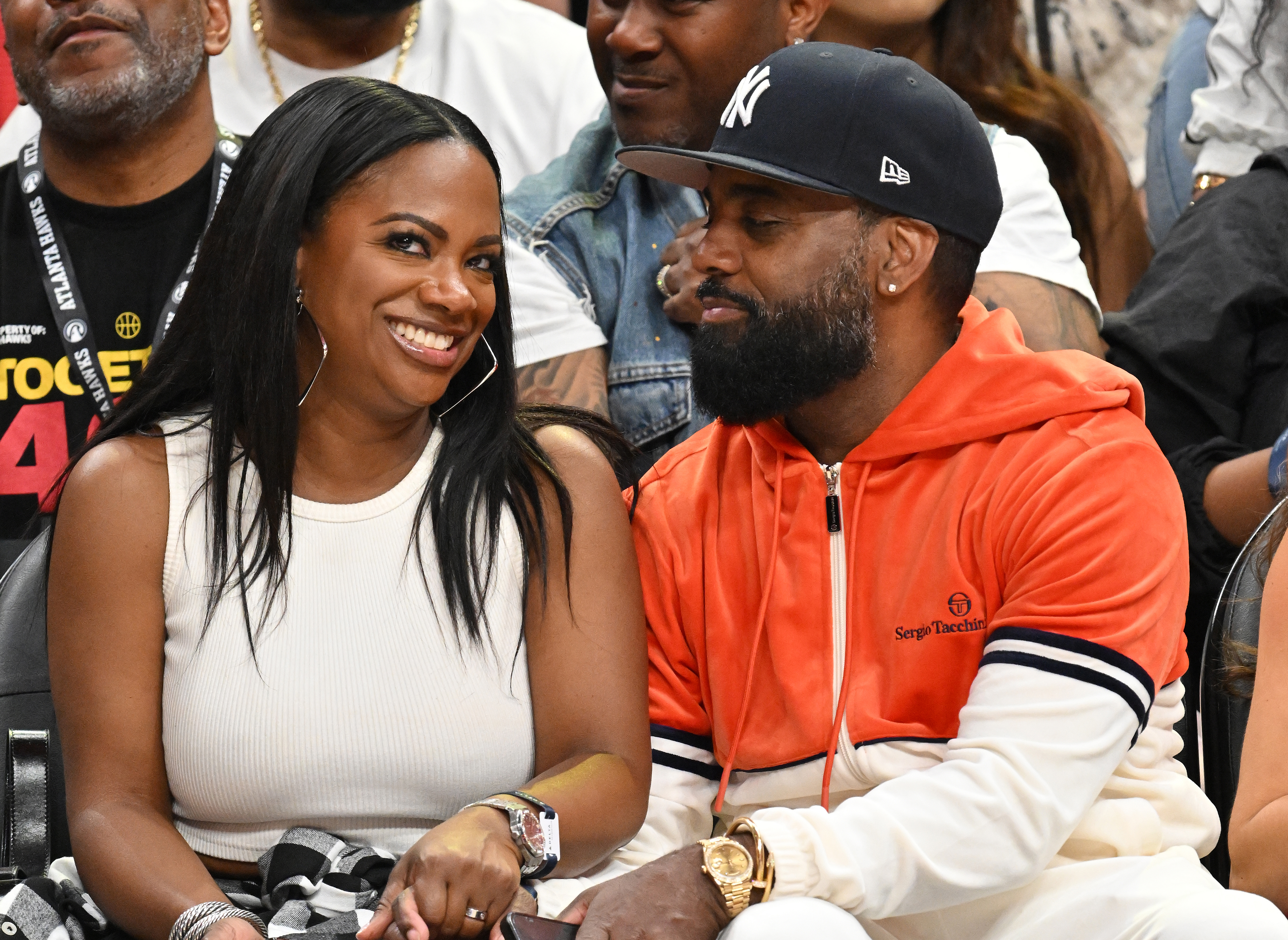 Kandi Burruss and Todd Tucker at an NBA game.