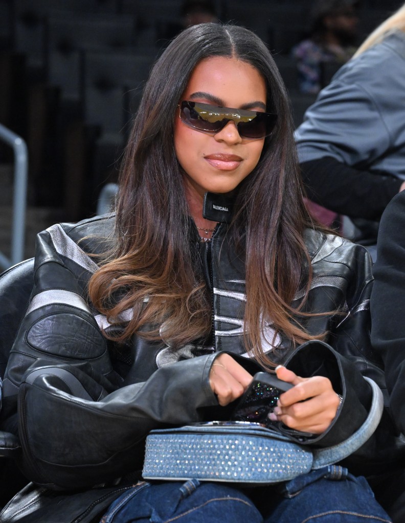 Blue Ivy Carter attending a basketball game at Crypto.com Arena.