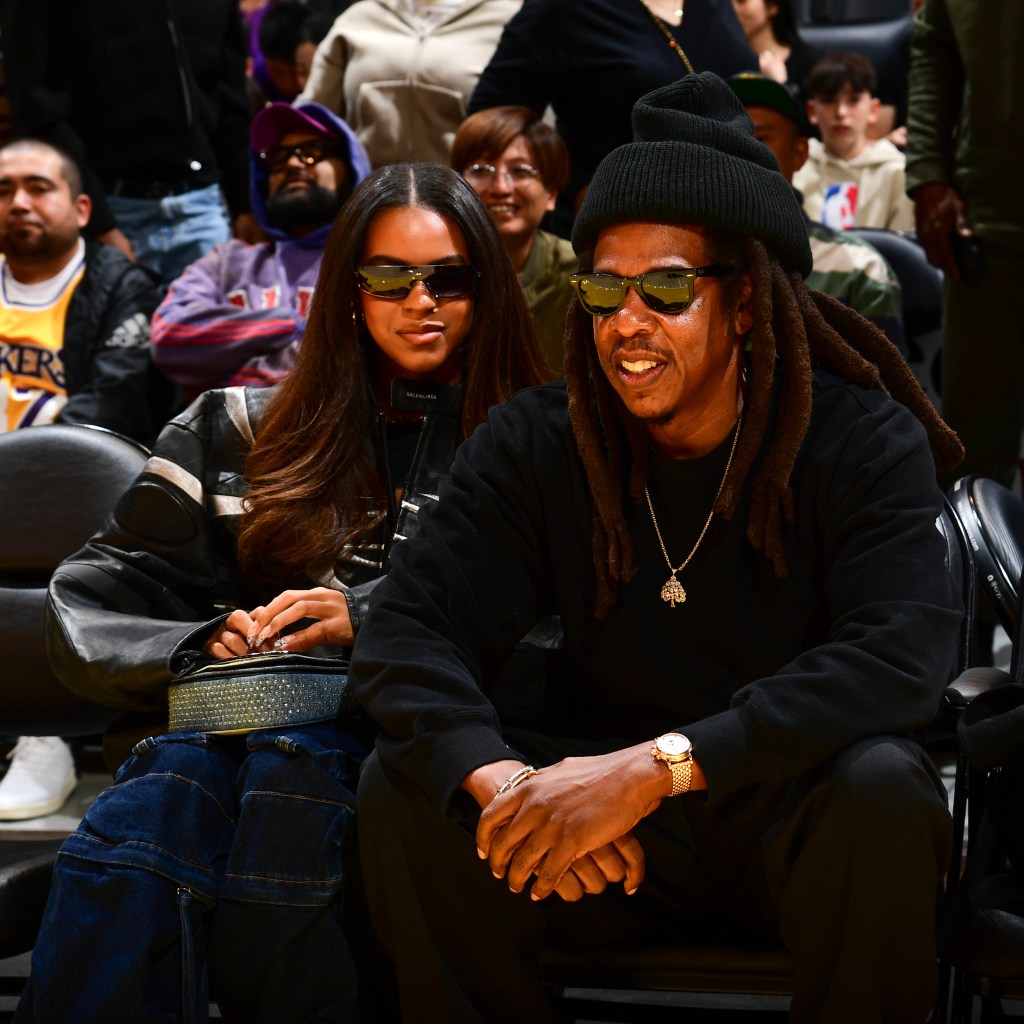 Blue Ivy Carter and Jay-Z attending the San Antonio Spurs vs. Los Angeles Lakers game.