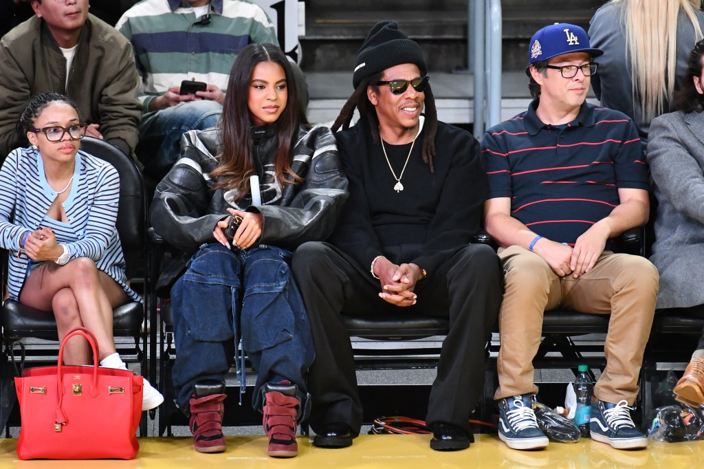 Jay-Z and Blue Ivy Carter attend a Los Angeles Lakers basketball game.