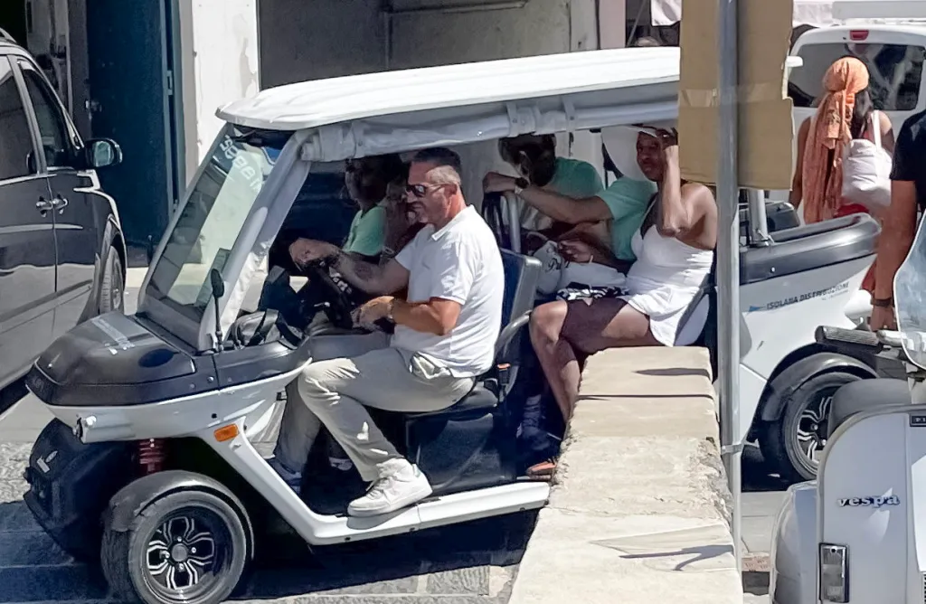 Venus Williams was spotted preparing for her wedding in Italy which takes place today. The 45-year-old is set to marry actor Andrea Preti on the island of Ischia in Italy. Onlookers on holiday saw her riding in the back of a golf cart in a white dress and sun hat riding in the back of a golf cart yesterday (10) in the village of Sant'Angelo. According to a bystander, Serena was also in the buggy and members of the wedding party were wearing 'Team Groom' and 'Team Bride' t-shirts.
