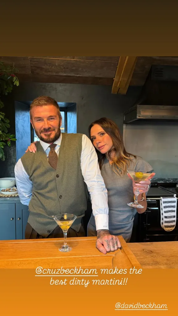 David and Victoria Beckham behind a bar with martinis.