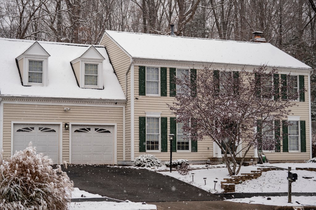 The snow-covered home of Brian Cole, suspected of planting bombs outside the RNC and DNC headquarters in 2021, in Woodbridge, VA.