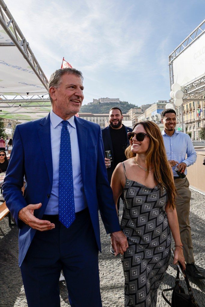 Bill de Blasio walks with Nomiki Konst during the Bufala Fest food event.